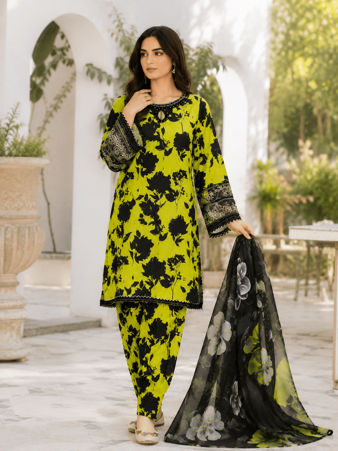 Black floral printed chiffon dupatta detail with lime green Pakistani suit