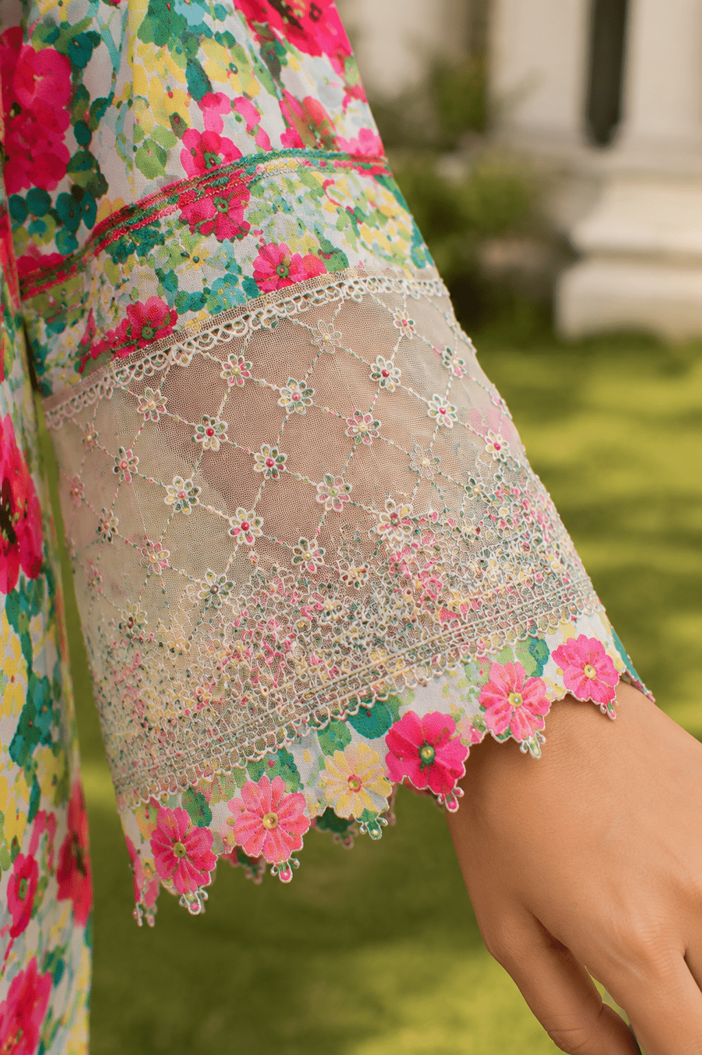 Ameer's 97500 lawn collection sleeve detail with delicate floral print, embroidered net lace and designer cuff finishing