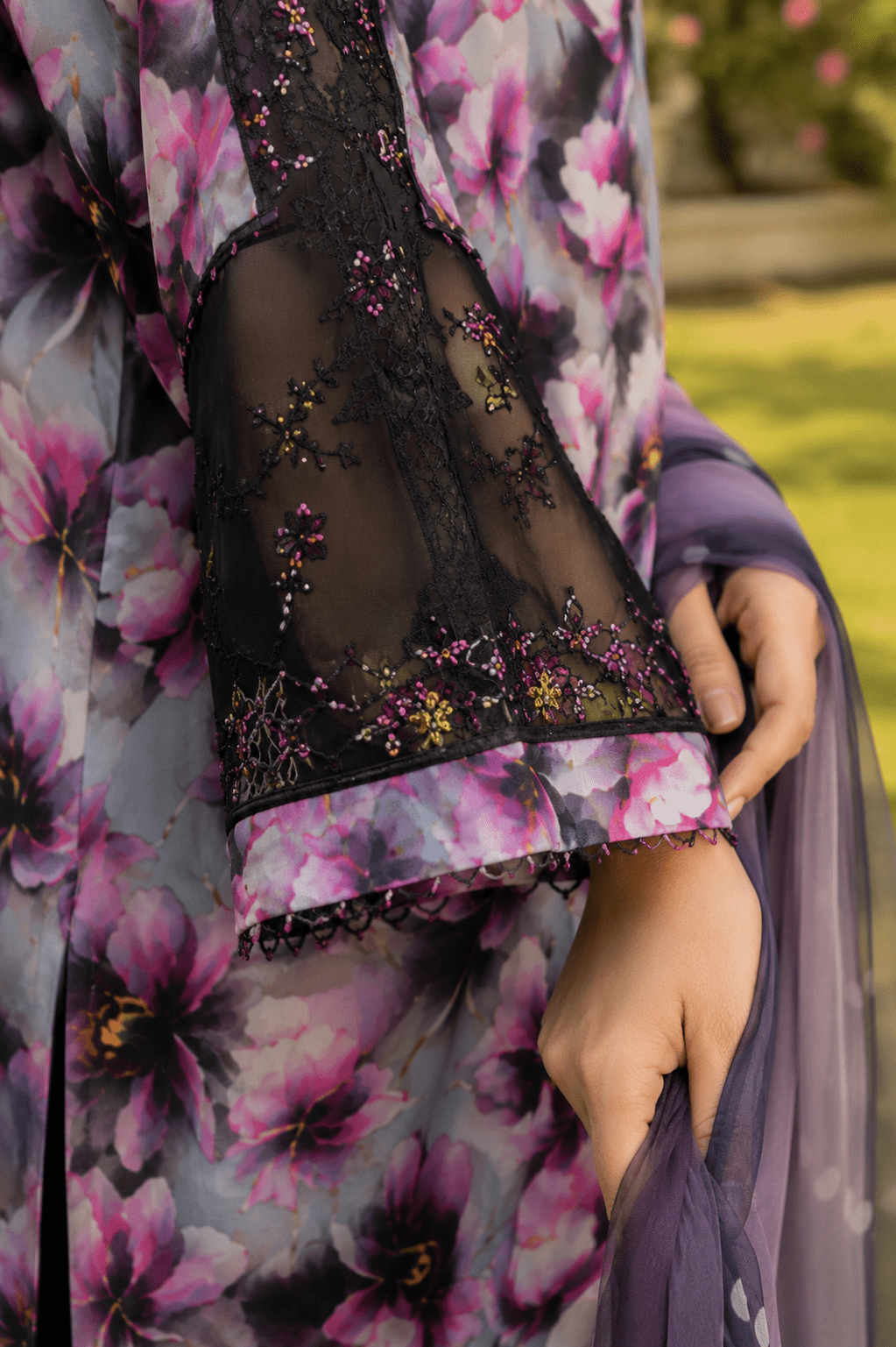 Close-up sleeve detail of Ameer's 97500 floral lawn suit featuring embroidered net cuff, lace finishing, premium stitching and designer sleeve work
