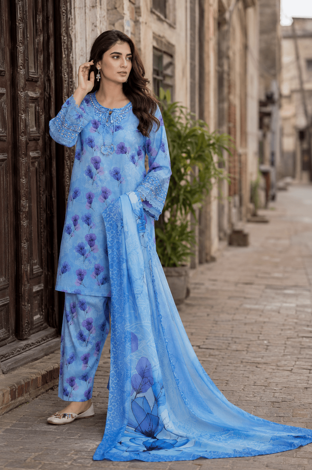 Ameer’s 99200 sky blue floral printed 3 piece lawn suit with embroidered sleeves, printed dupatta and matching trousers for women